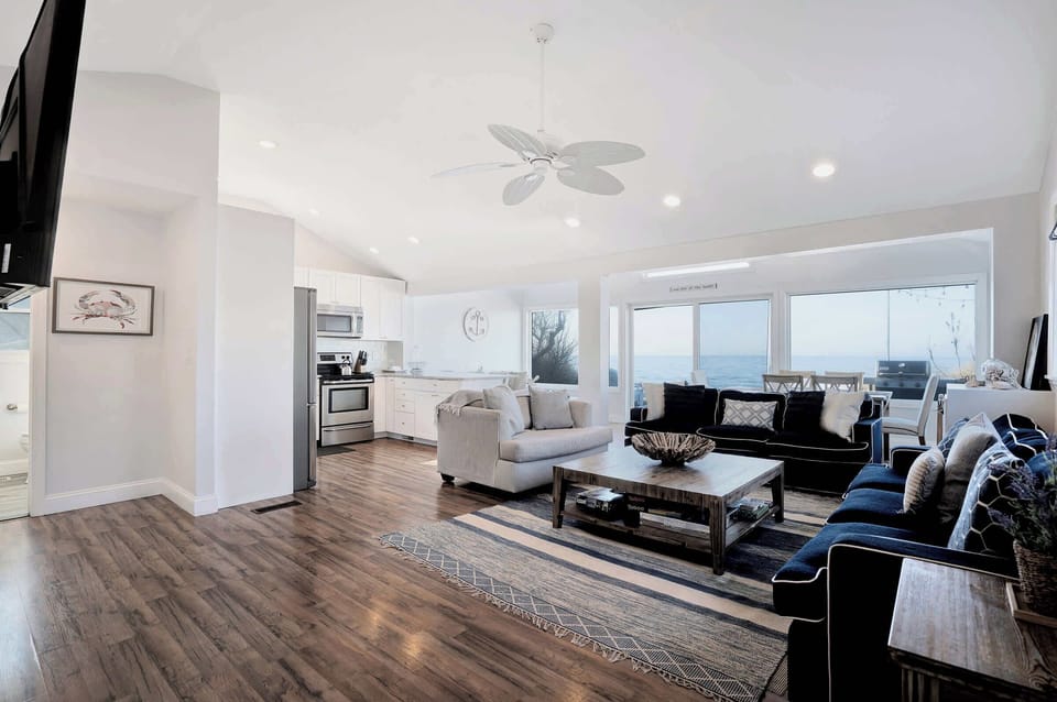 Light-filled living area with panoramic water views