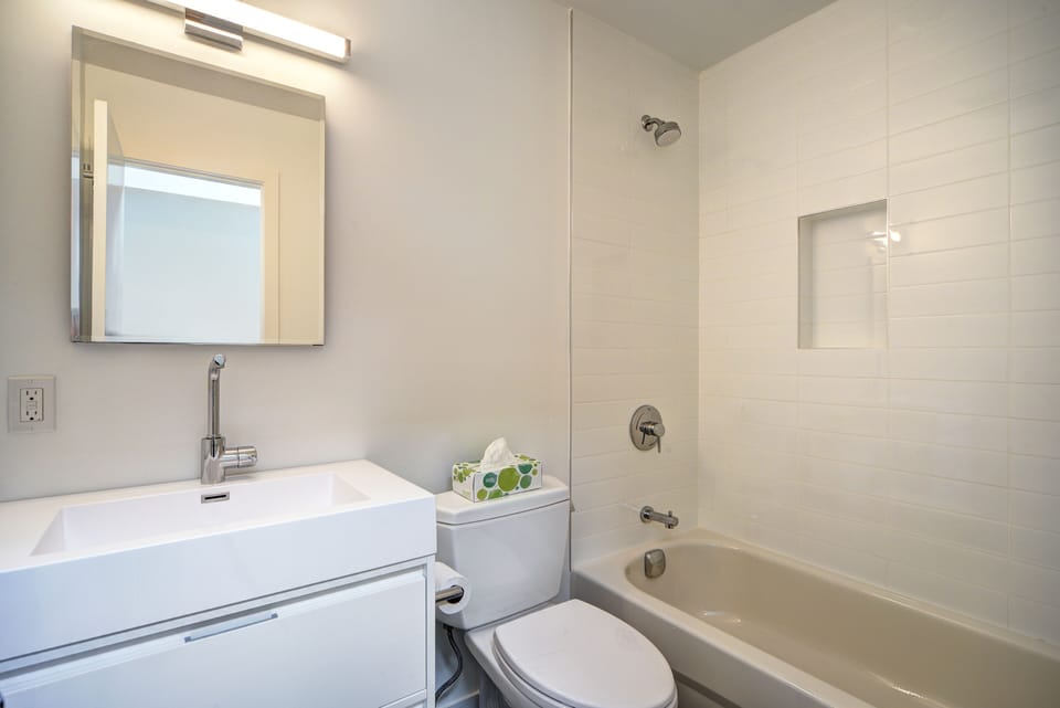 Upstairs shared bath with Duravit sink, Toto toilet, & Grohe fixtures