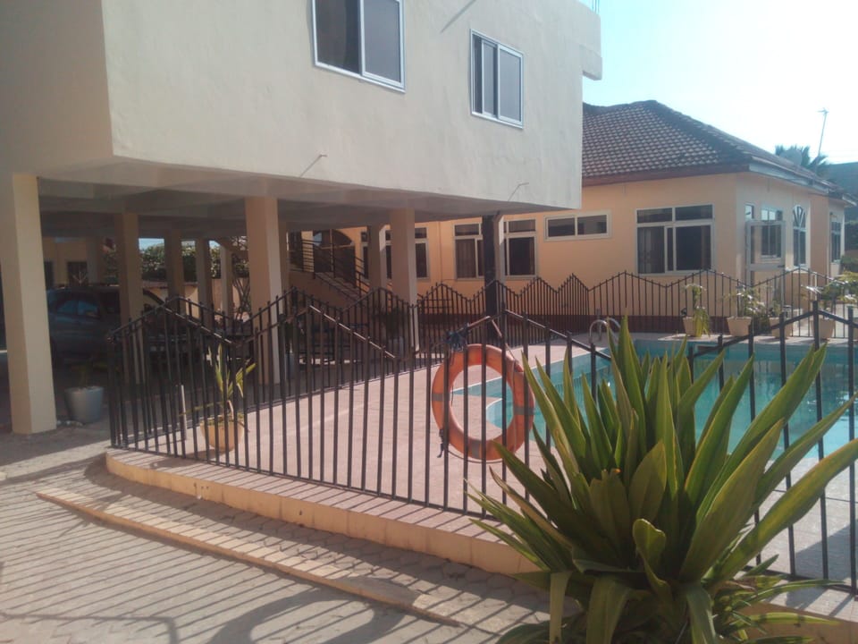 swimming pool area/ back of villa apartment overlooking the pool