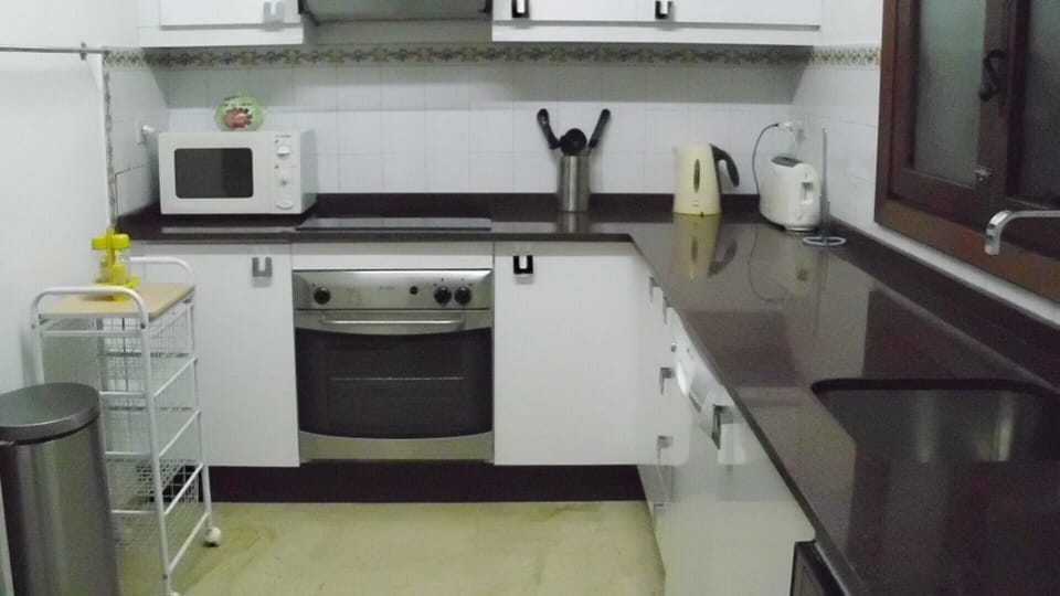 Kitchen with door to Dining terrace