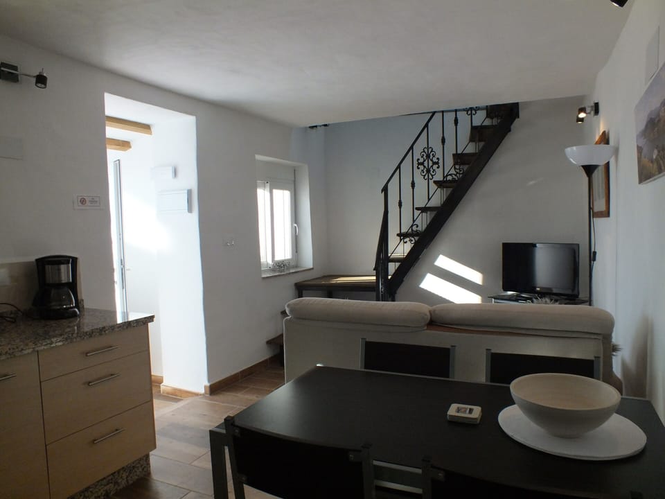 Stairs up to master bedroom and roof terrace.