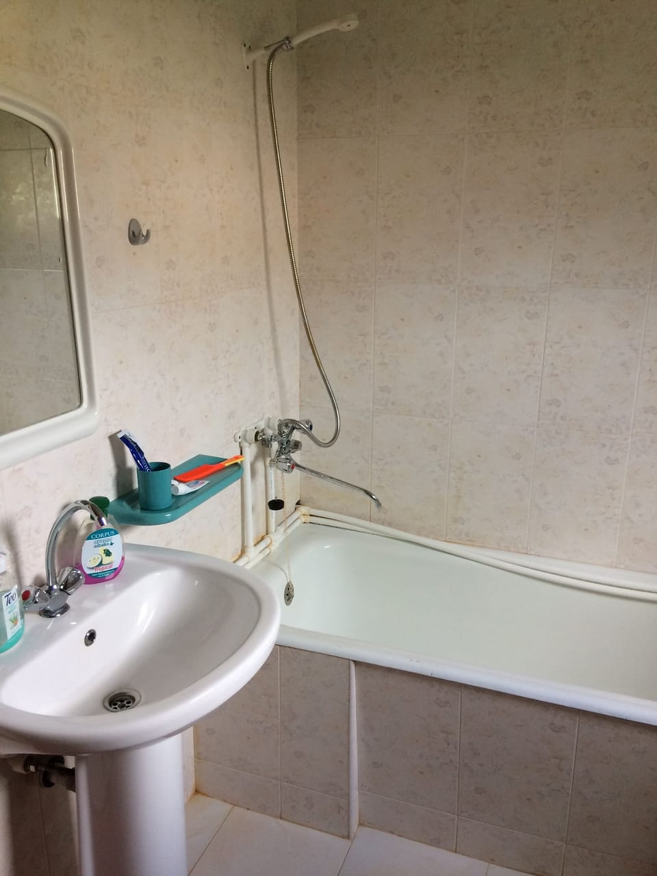 Separate tub and shower, free toiletries, hair dryer, slippers