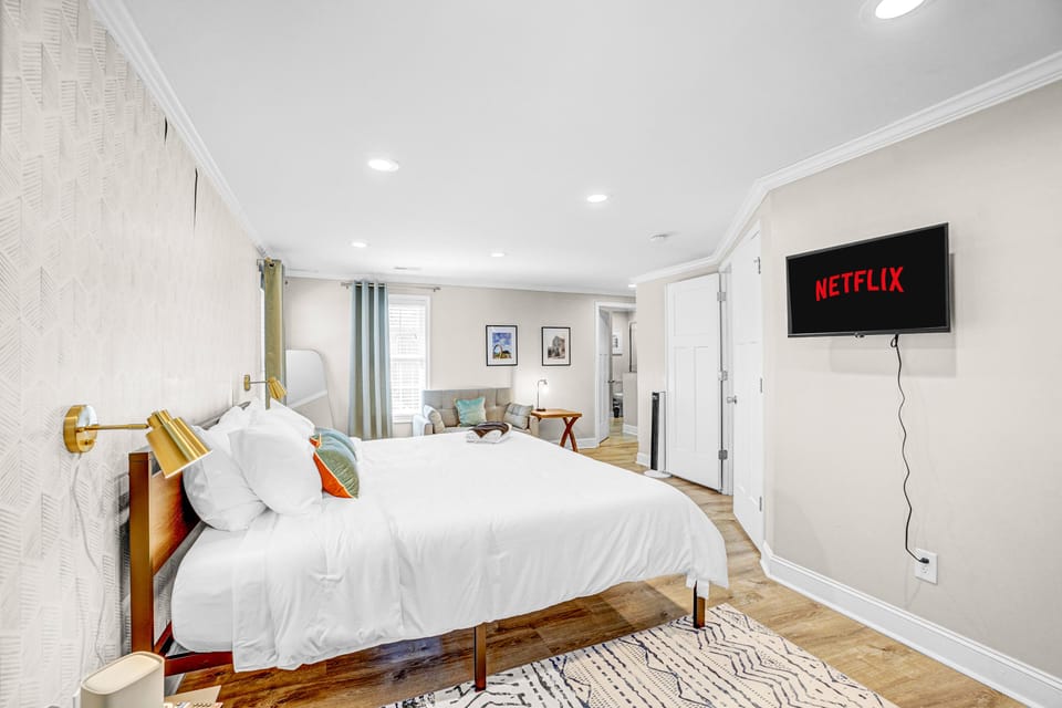 Luxurious master bedroom featuring king bed