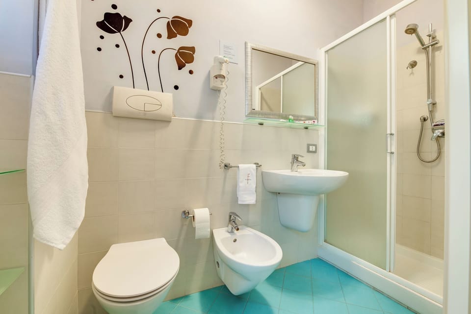 Double or Twin Room | Bathroom | Shower, free toiletries, hair dryer, bidet