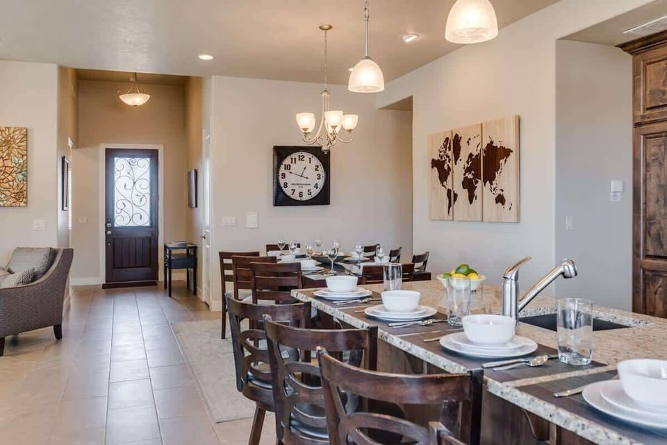 Open concept kitchen with bar and dining table