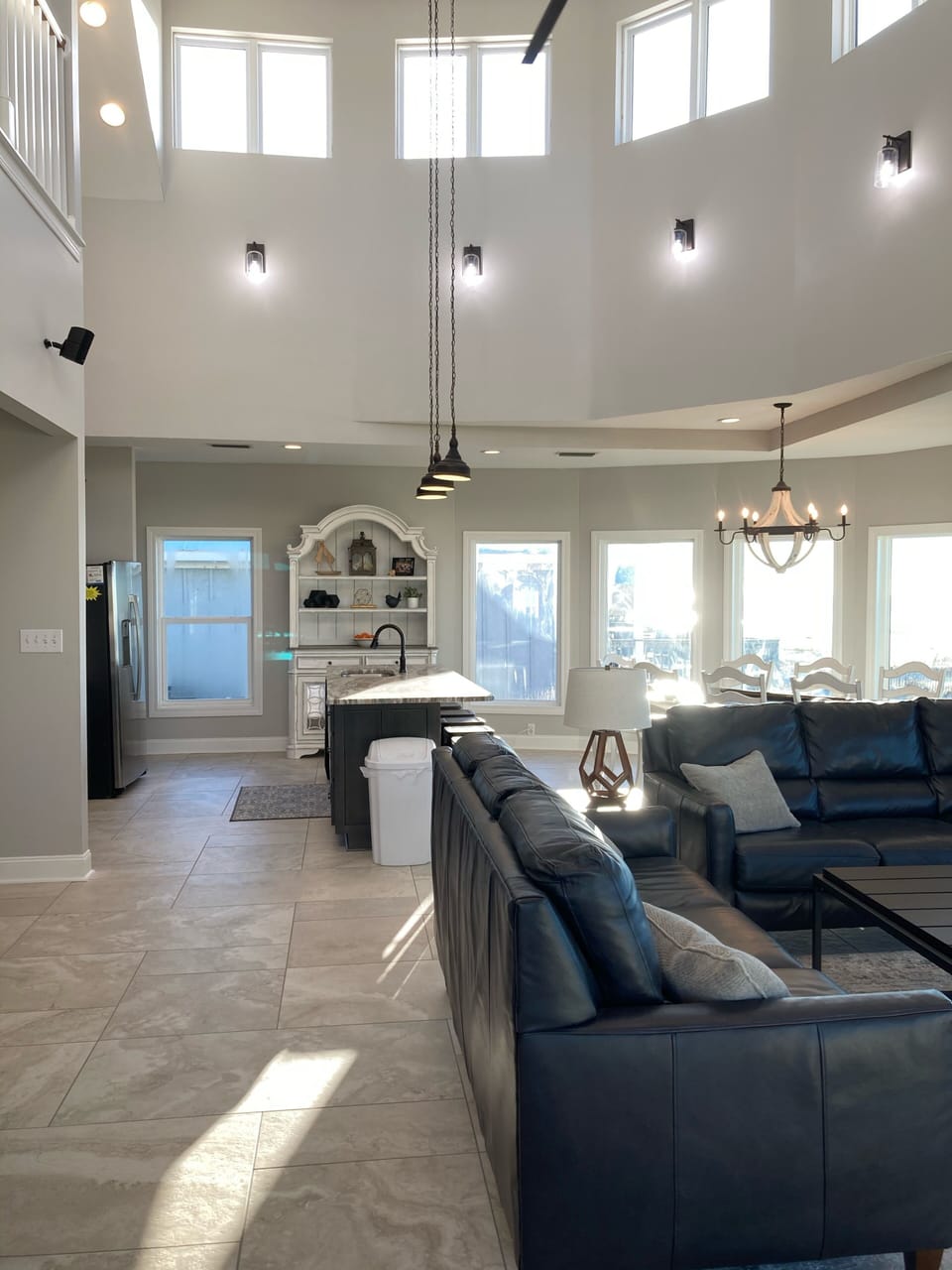 coming through the front door is Living Room and Kitchen