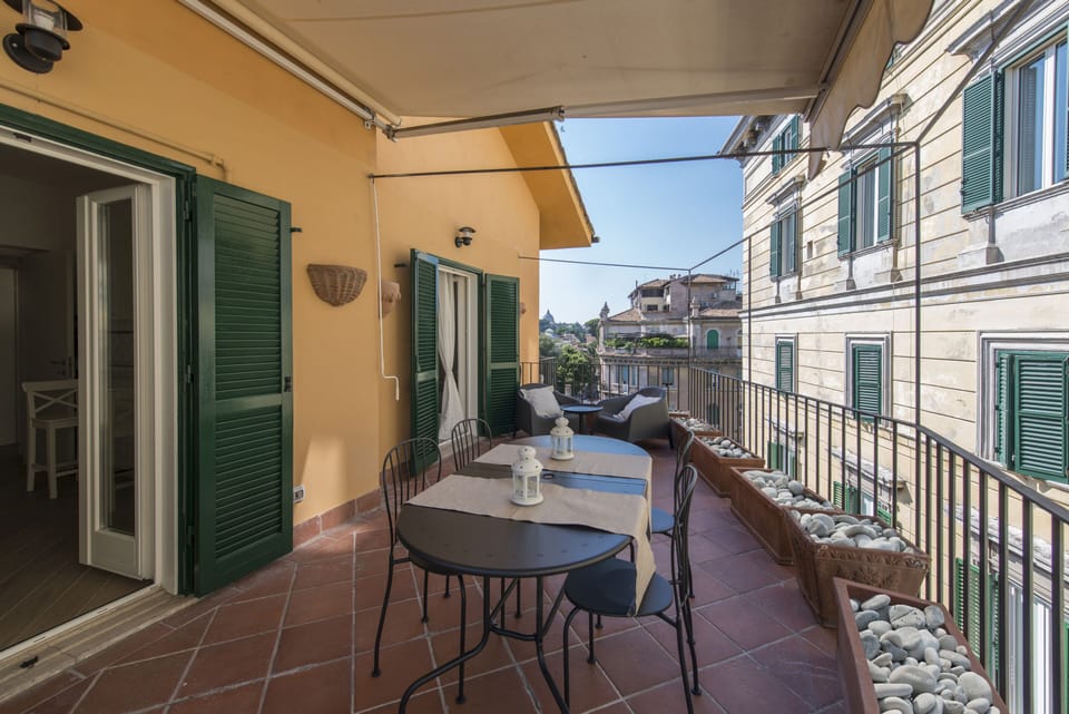 The terrace and the windows to the dining room and kitchen
