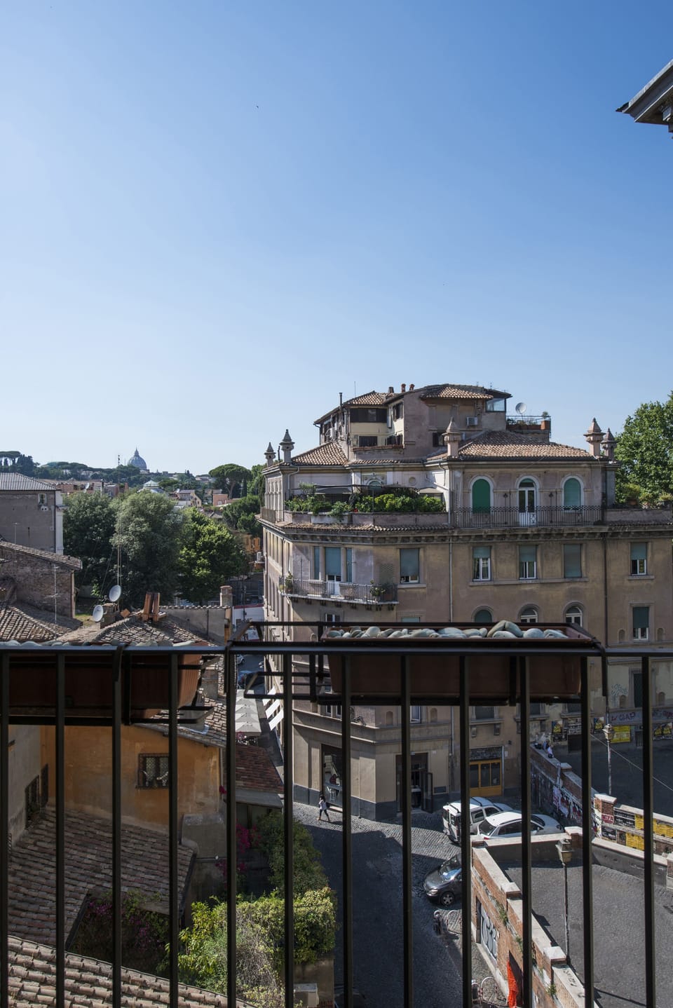 The view from the terrace: saint Peter and Trastevere roofs and street