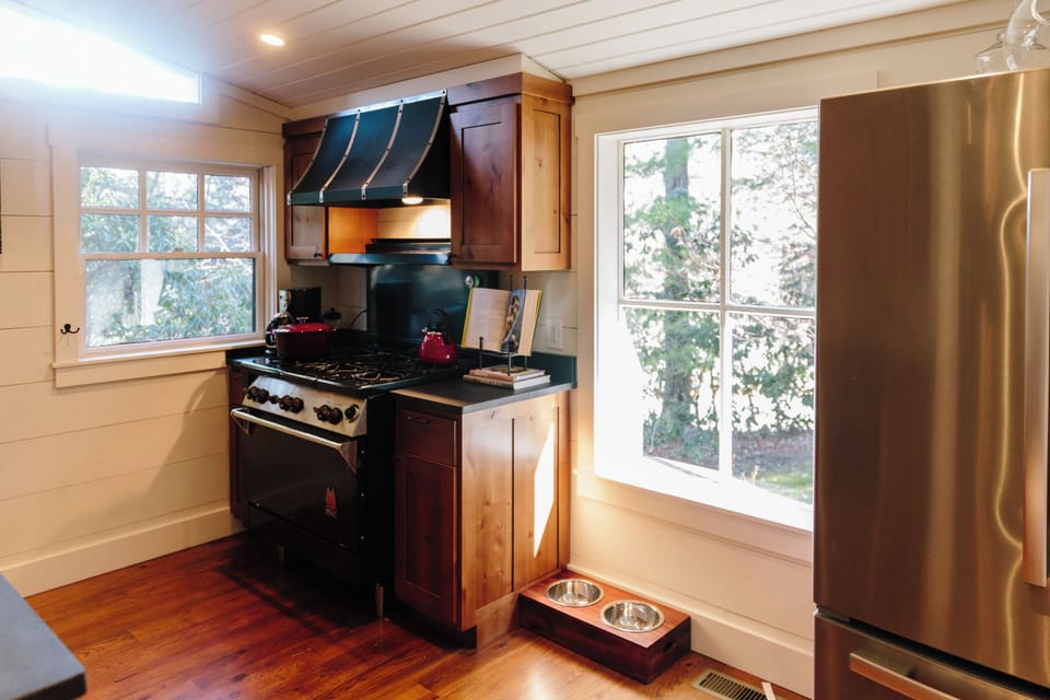 Galley kitchen with lots of natural light.