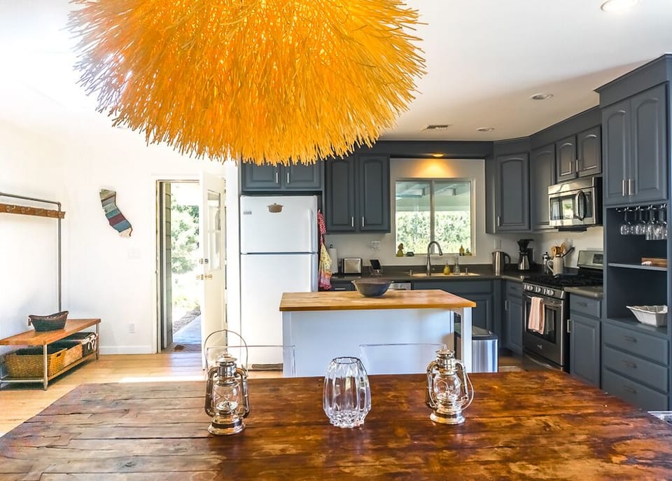Dining table and kitchen.