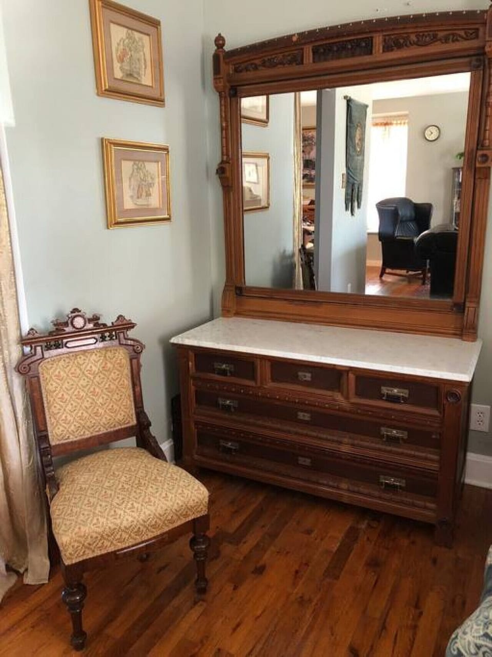 Extra sleeping area with dresser.