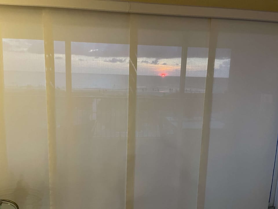 Sunset through our custom blinds