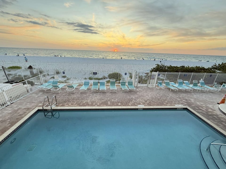 Pool overlooking the gorgeous blue Gulf!