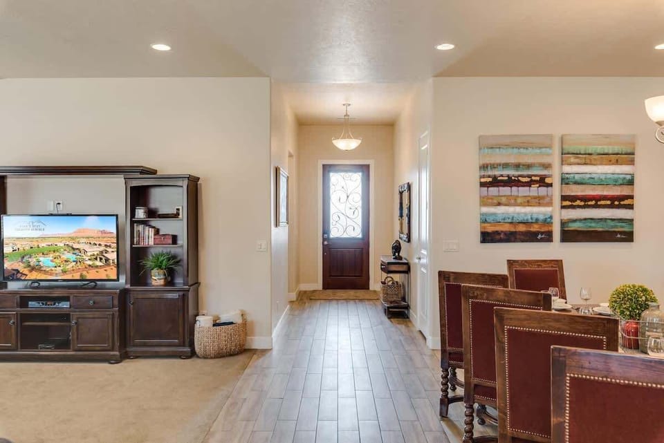 Entry opens to family room and dining areas