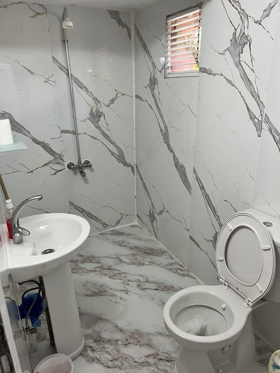 Shower, free toiletries, hair dryer, slippers
