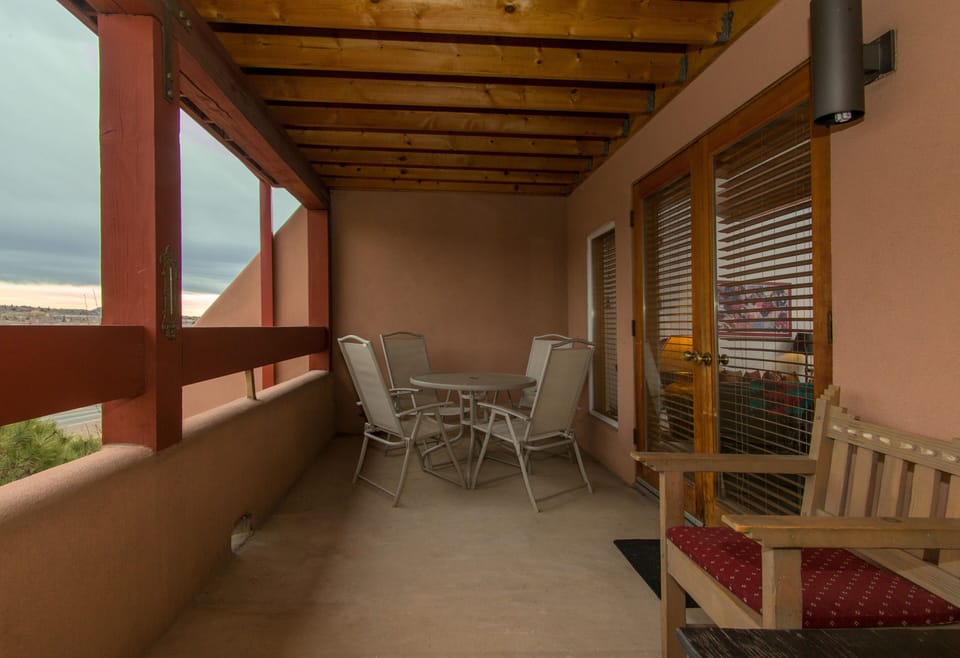 Balcony with table and chairs