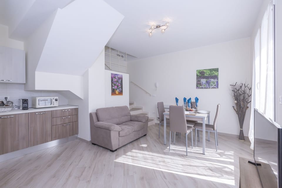 Living room with sofa and dining table