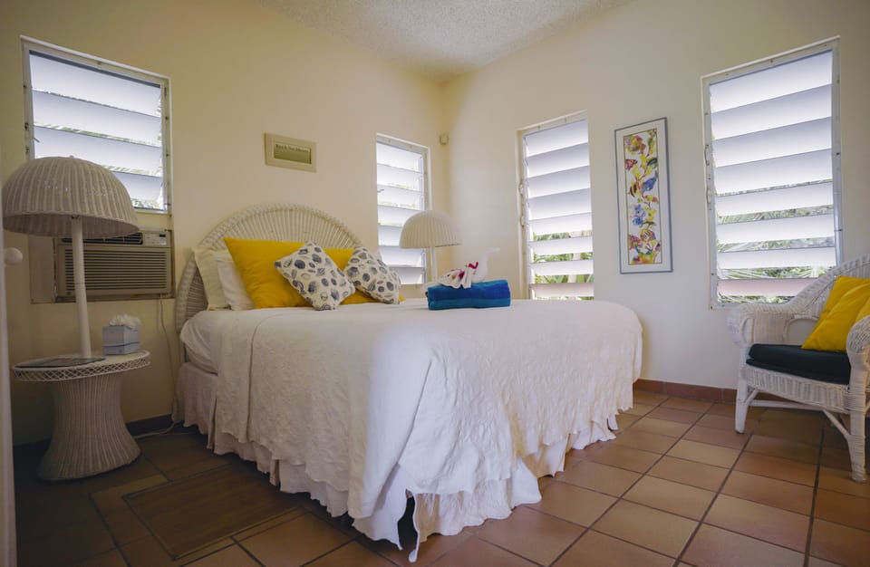 Stay cool with ceiling fans, cross breeze from screened windows or A/C 