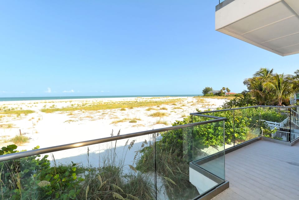 Two bedrooms and main living area enjoy spacious balconies.