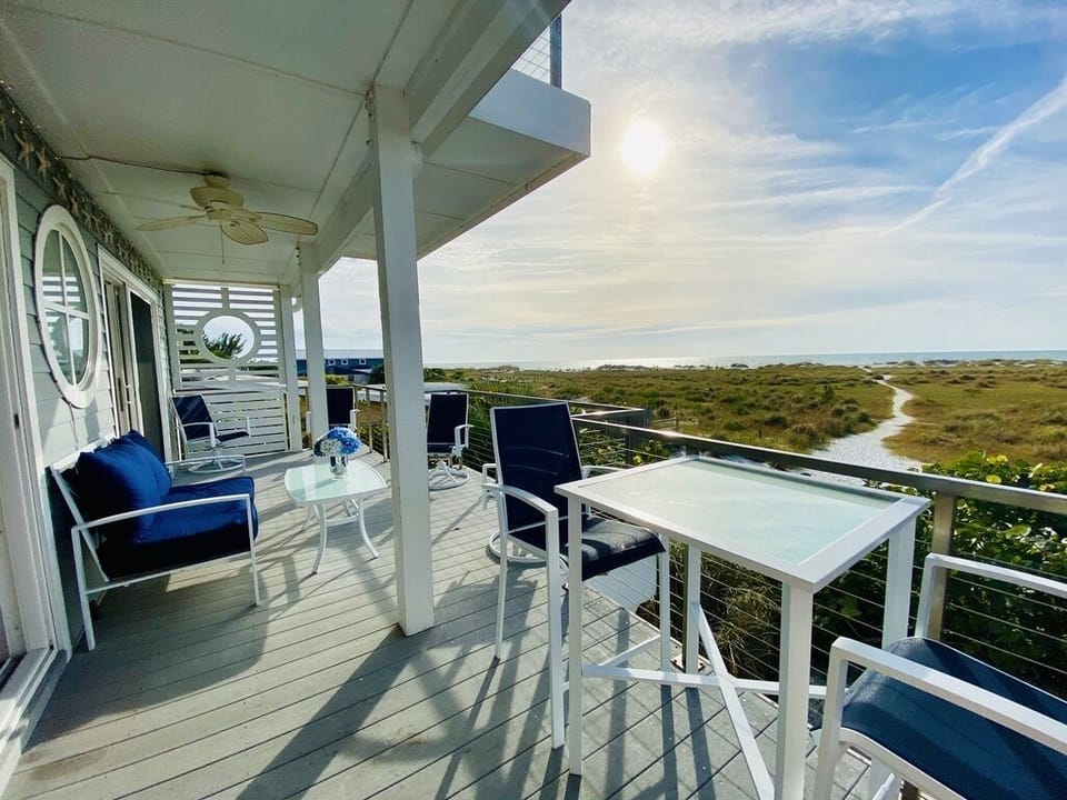 Patio with plenty of seating overlooking the Gulf of Mexico.