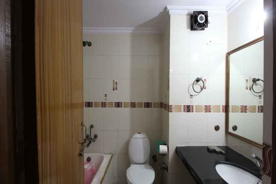 Shower, free toiletries, slippers, towels