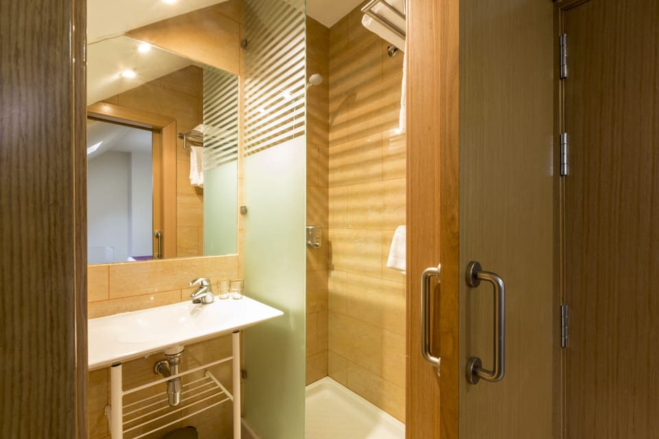 Shower, free toiletries, hair dryer, towels