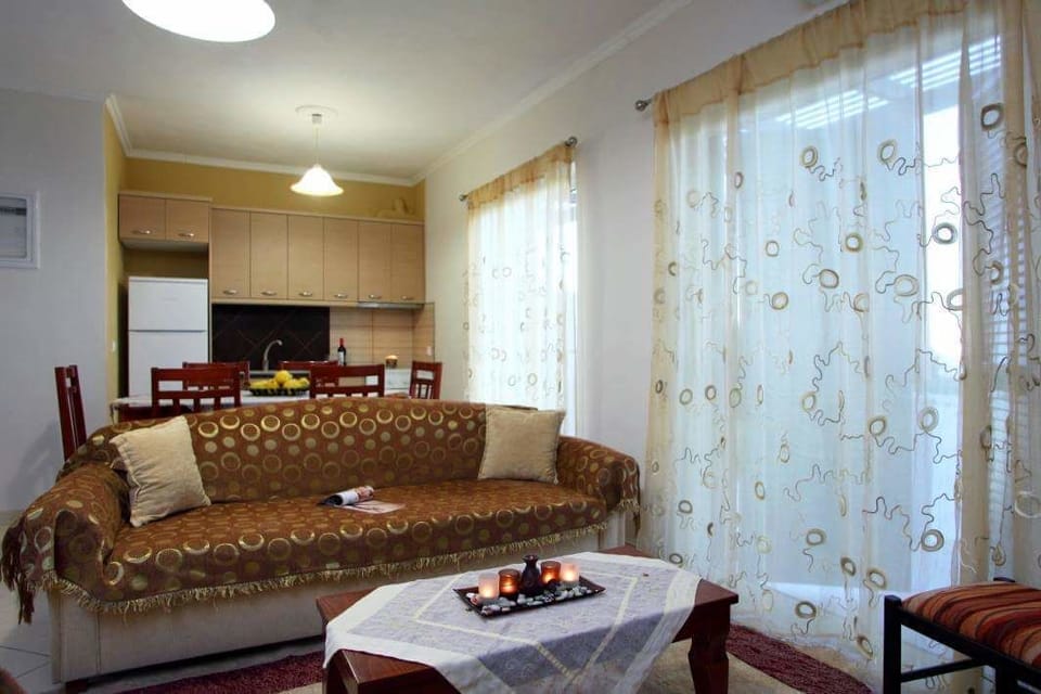 Apartment, 2 Bedrooms | Living room | Flat-screen TV