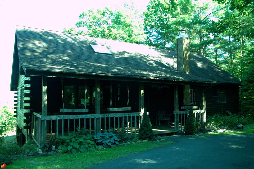 Front side of house as viewed from large private driveway