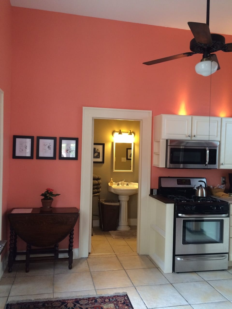 The kitchen is spacious. 
the table folds out for dining.