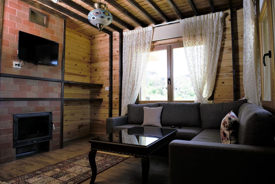 Junior Suite | Living room | Flat-screen TV
