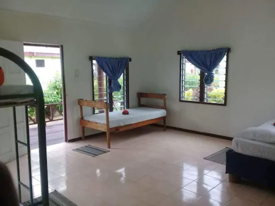 Traditional Cabin, 1 Bedroom, Partial Ocean View, Beachfront | Iron/ironing board, WiFi, bed sheets