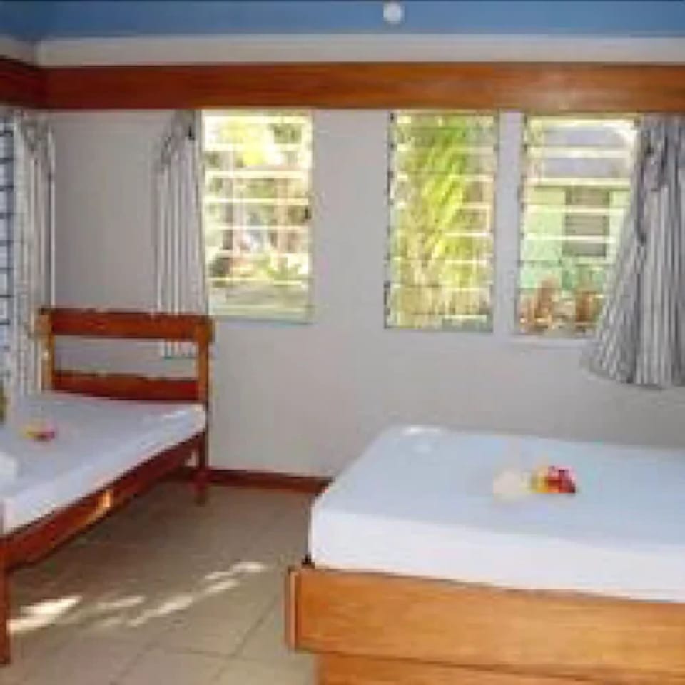 Traditional Cabin, 1 Bedroom, Partial Ocean View, Beachfront | Iron/ironing board, WiFi, bed sheets