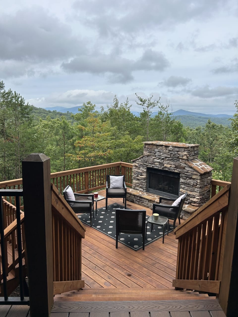 A Change In Altitude Outdoor Fireplace and Deck 