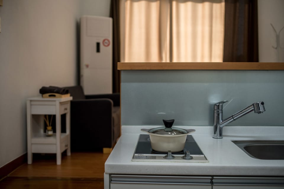 Junior Suite, 1 Double Bed | Private kitchenette | Full-size fridge, microwave, electric kettle, rice cooker