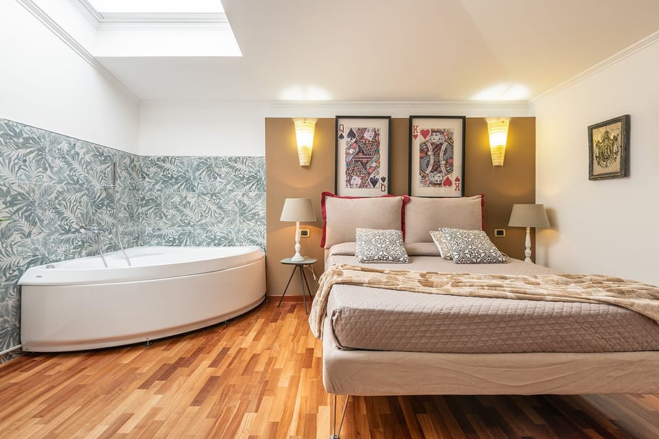 Junior Suite, Jetted Tub | Minibar, individually decorated, individually furnished, desk