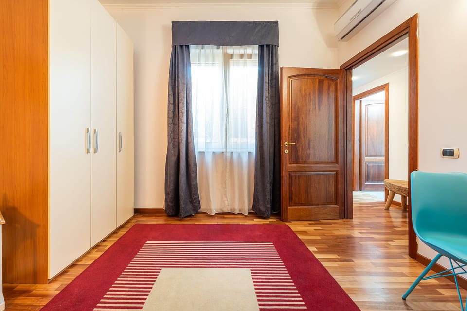 Junior Suite, Jetted Tub | Living area | 42-inch flat-screen TV with digital channels, TV