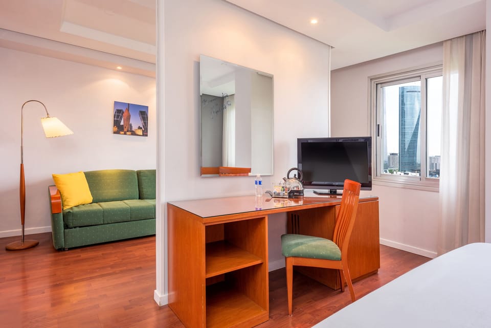 Premium Room, 1 Queen Bed (with Living Room) | Minibar, in-room safe, desk, laptop workspace
