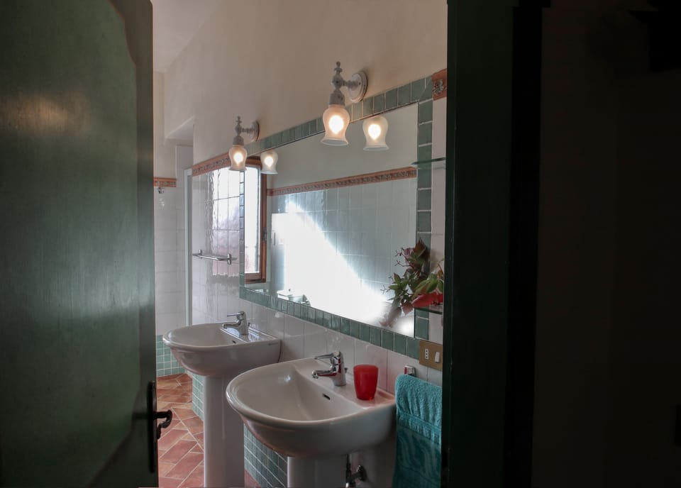 Apartment, 2 Bedrooms, Garden View (Girasole) | Bathroom | Shower, free toiletries, hair dryer, bidet