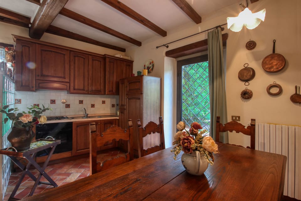 Apartment, 2 Bedrooms, Garden View (Tulipano) | Private kitchen | Full-size fridge, oven, stovetop, coffee/tea maker