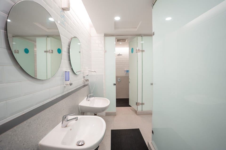 Shower, free toiletries, hair dryer, slippers