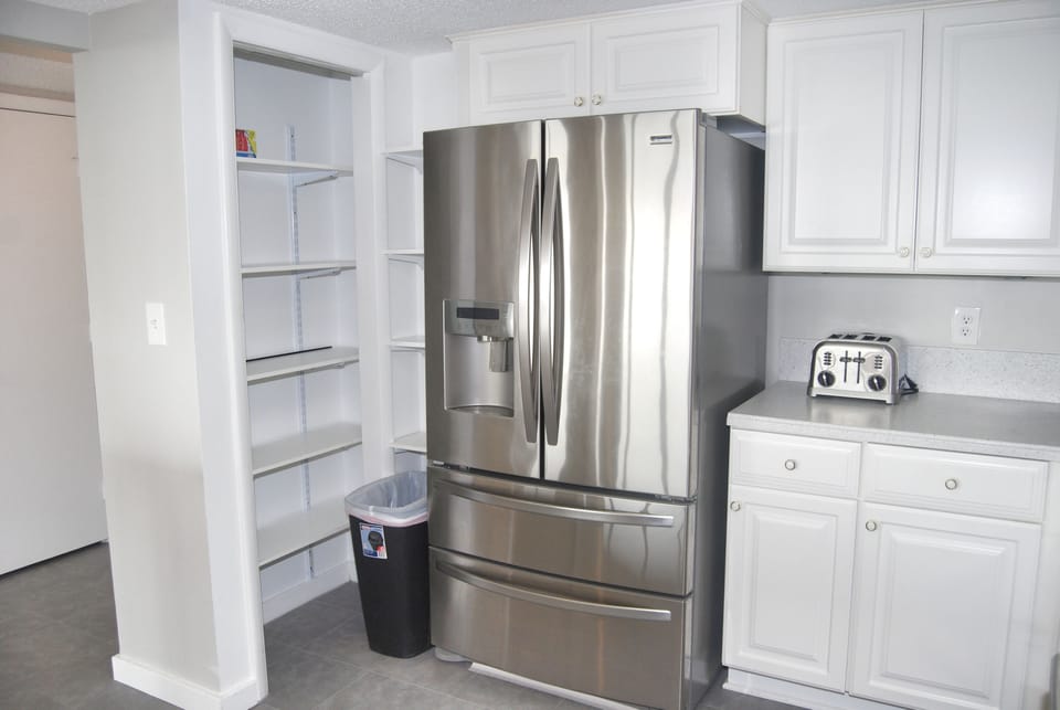 Condo, 3 Bedrooms | Private kitchen | Fridge, microwave, oven, dishwasher