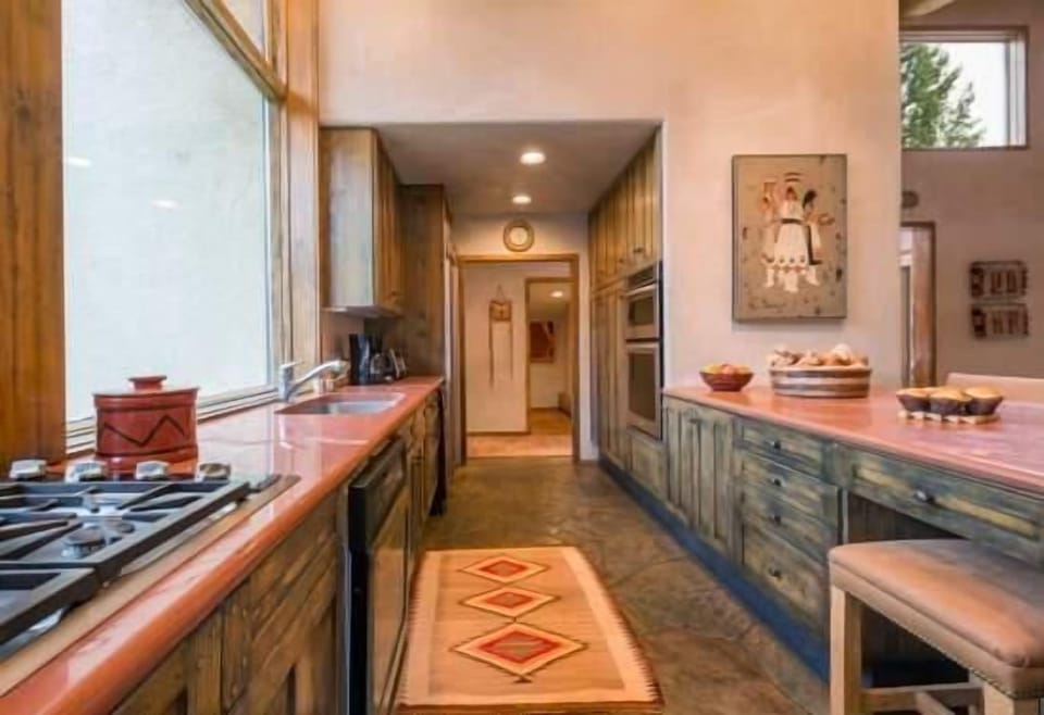 Condo, 3 Bedrooms | Private kitchen | Fridge, oven, coffee/tea maker, toaster