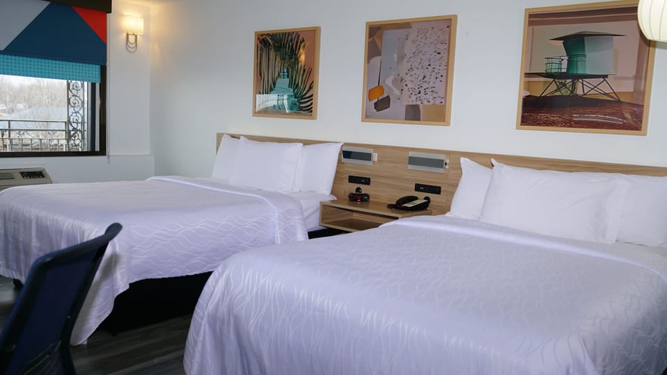Deluxe Room, 2 Queen Beds, Park View | Desk, laptop workspace, soundproofing, iron/ironing board