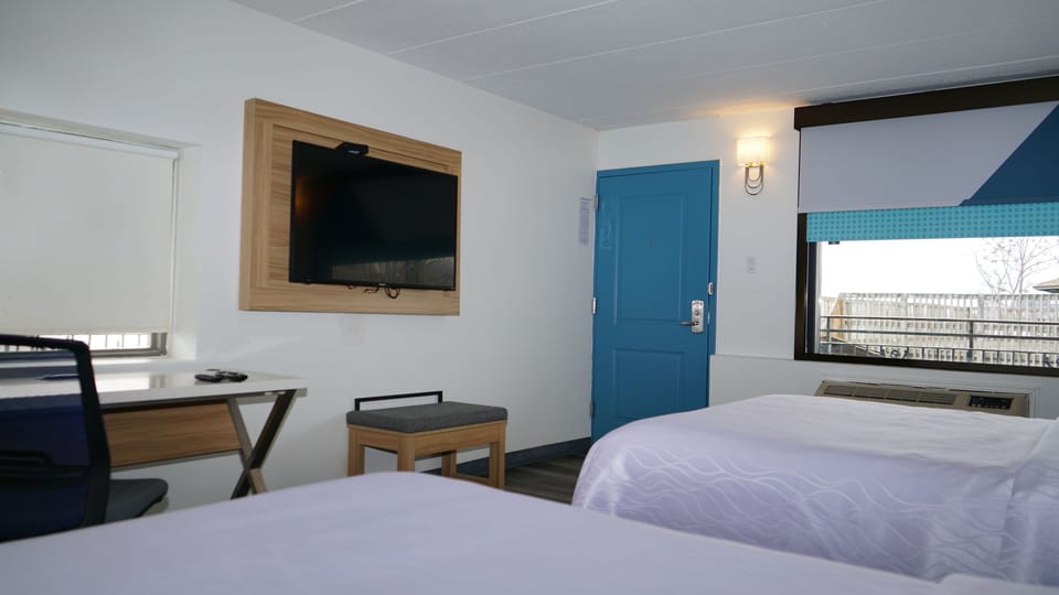 Deluxe Room, 2 Queen Beds, Park View | Desk, laptop workspace, soundproofing, iron/ironing board