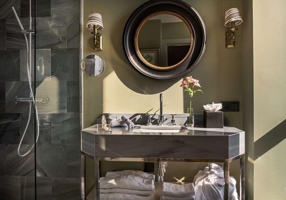Shower, rainfall showerhead, eco-friendly toiletries, hair dryer