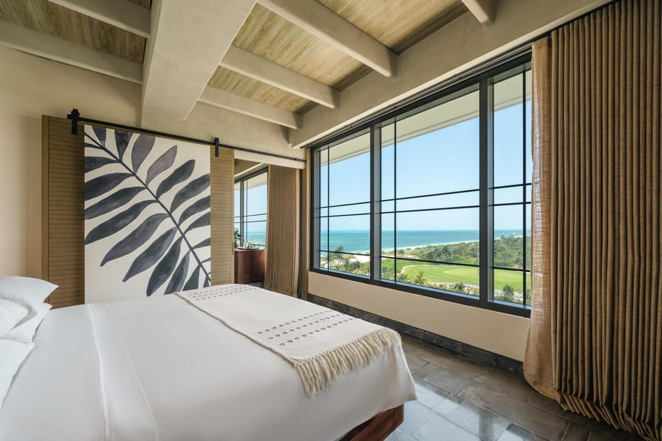 Premium bedding, down comforters, free minibar, in-room safe