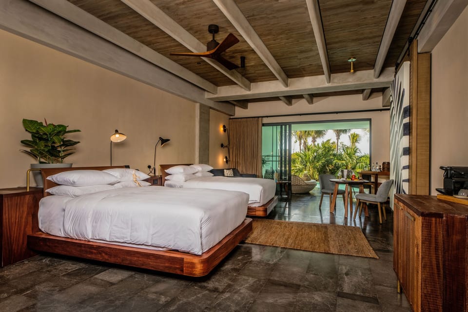 Premium bedding, down comforters, free minibar, in-room safe
