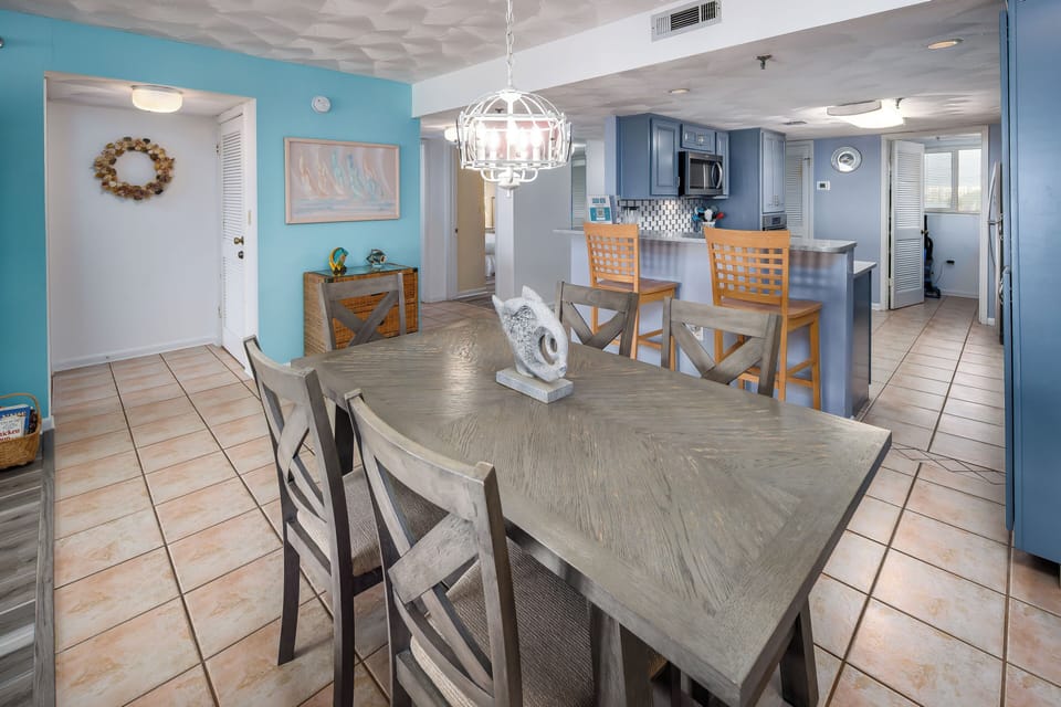 Dining Area - Dining table with additional bar seating.