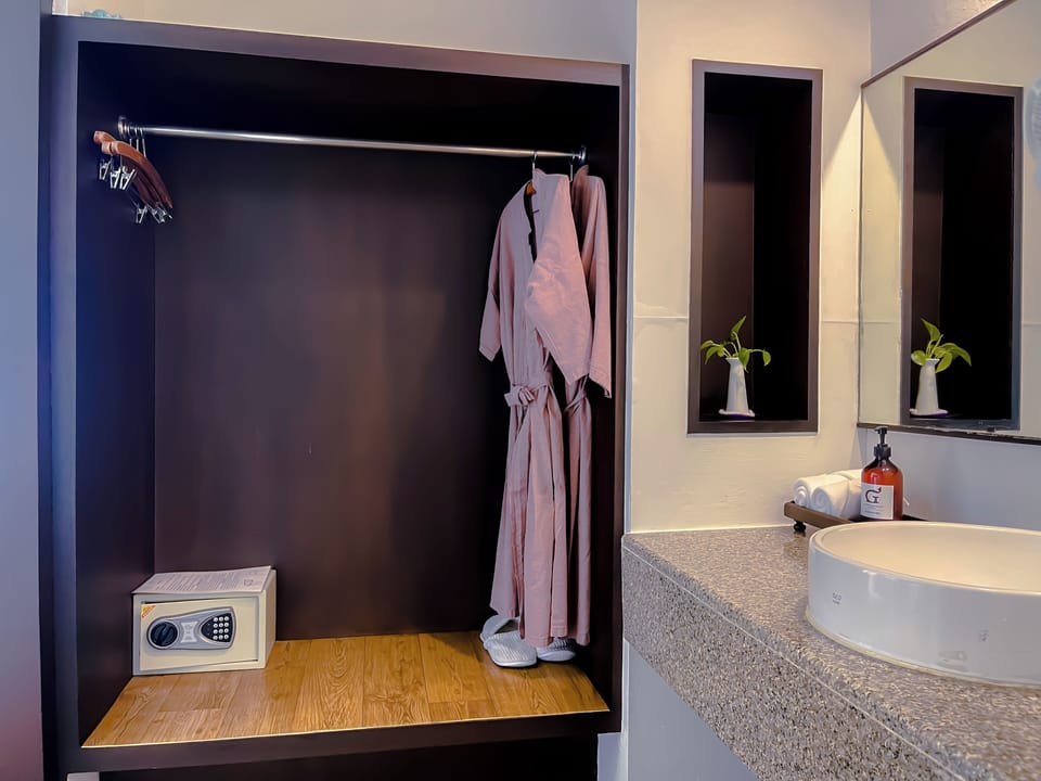 Family Room, Multiple Beds | Bathroom | Combined shower/tub, deep soaking tub, free toiletries, hair dryer