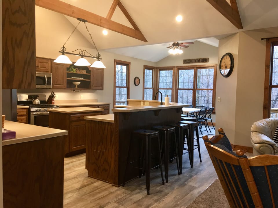 Kitchen and dining room.   Eating bar seats 9.